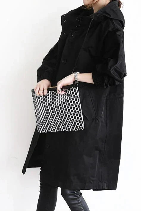DORY | Oversized trenchcoat gecombineerd met hoodie