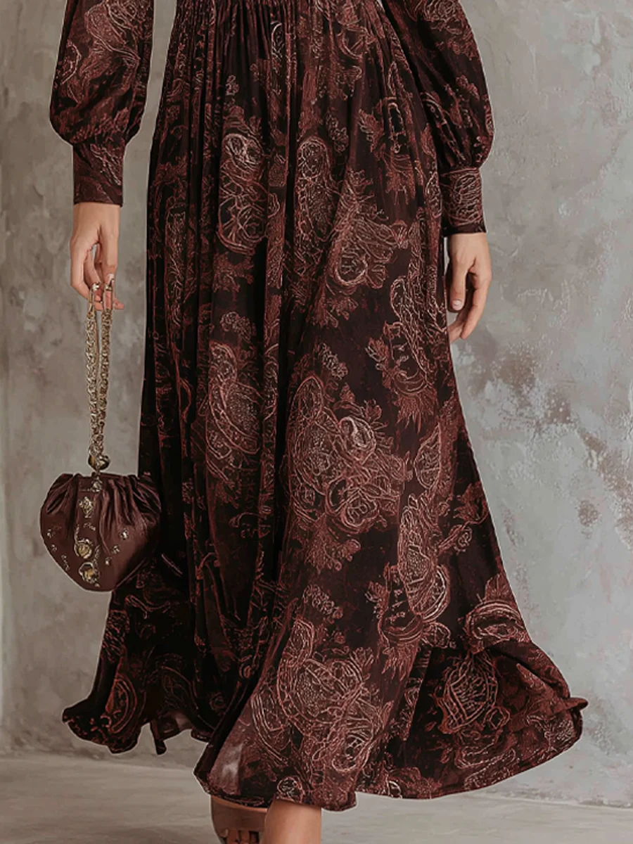 Marlene | Midi-jurk met paisleyprint en ritssluiting in de hals