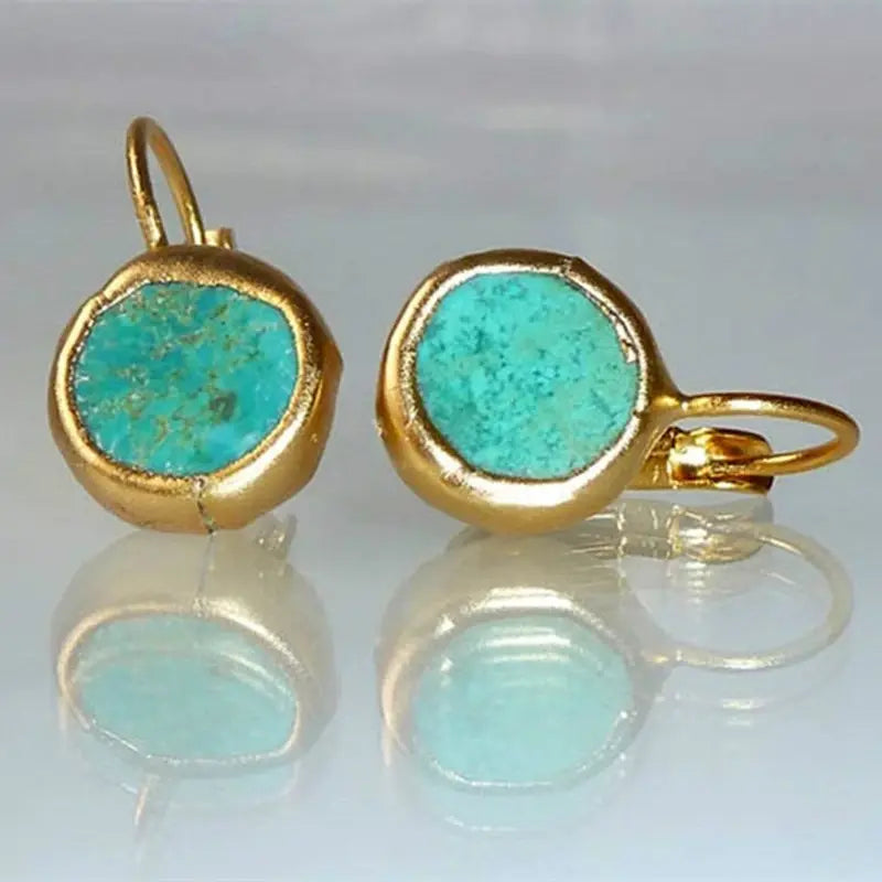Elegante oorbellen van goud met turkooissteen
